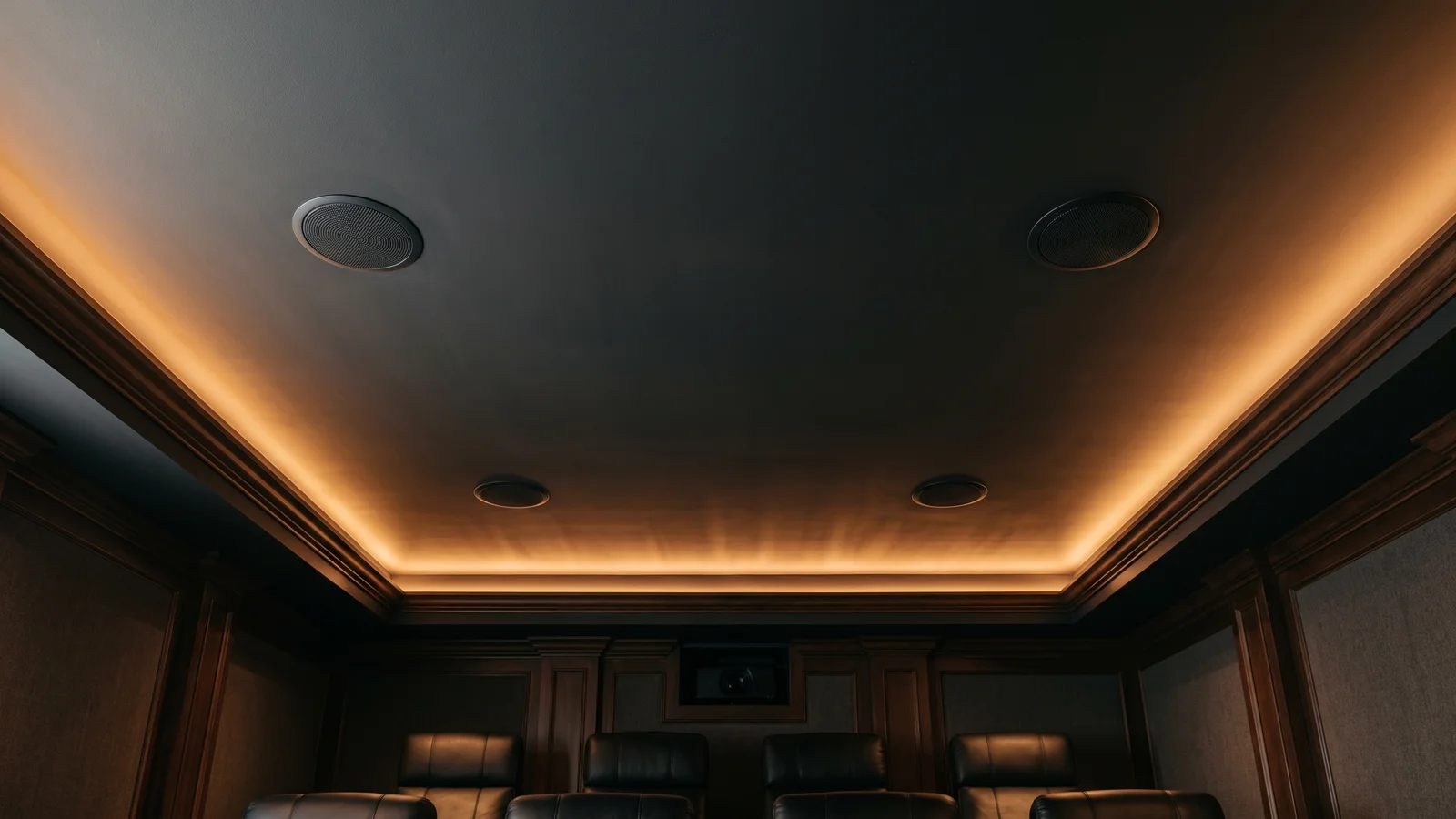 Looking up at the ceiling of a home theater with four small discreet flush overhead height speakers arranged in two pairs, the reference way to add a height layer