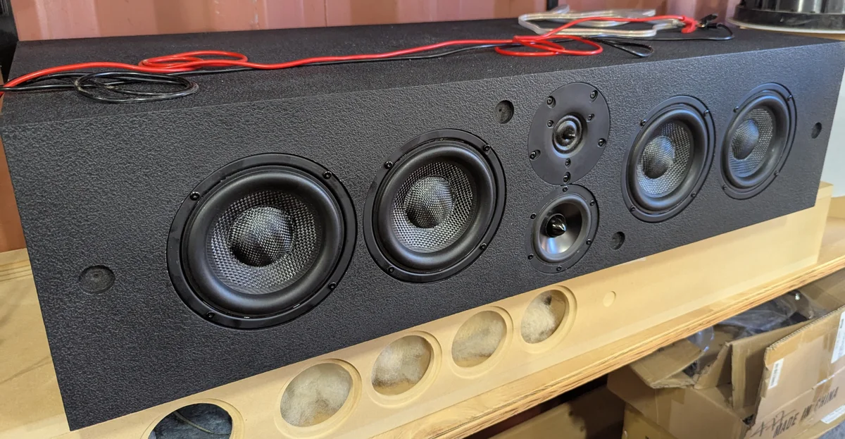 Finished WubWub Audio center channel speaker with drivers installed showing textured black coating
