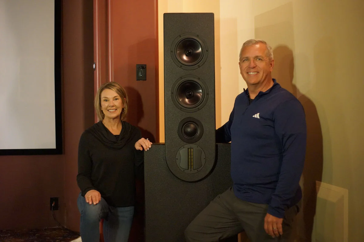 Mike Vincent with Paradise Valley client next to completed custom WubWub Audio tower speaker