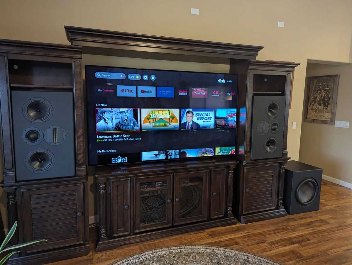 Custom home theater entertainment center with built-in speakers installed in Prescott Arizona home